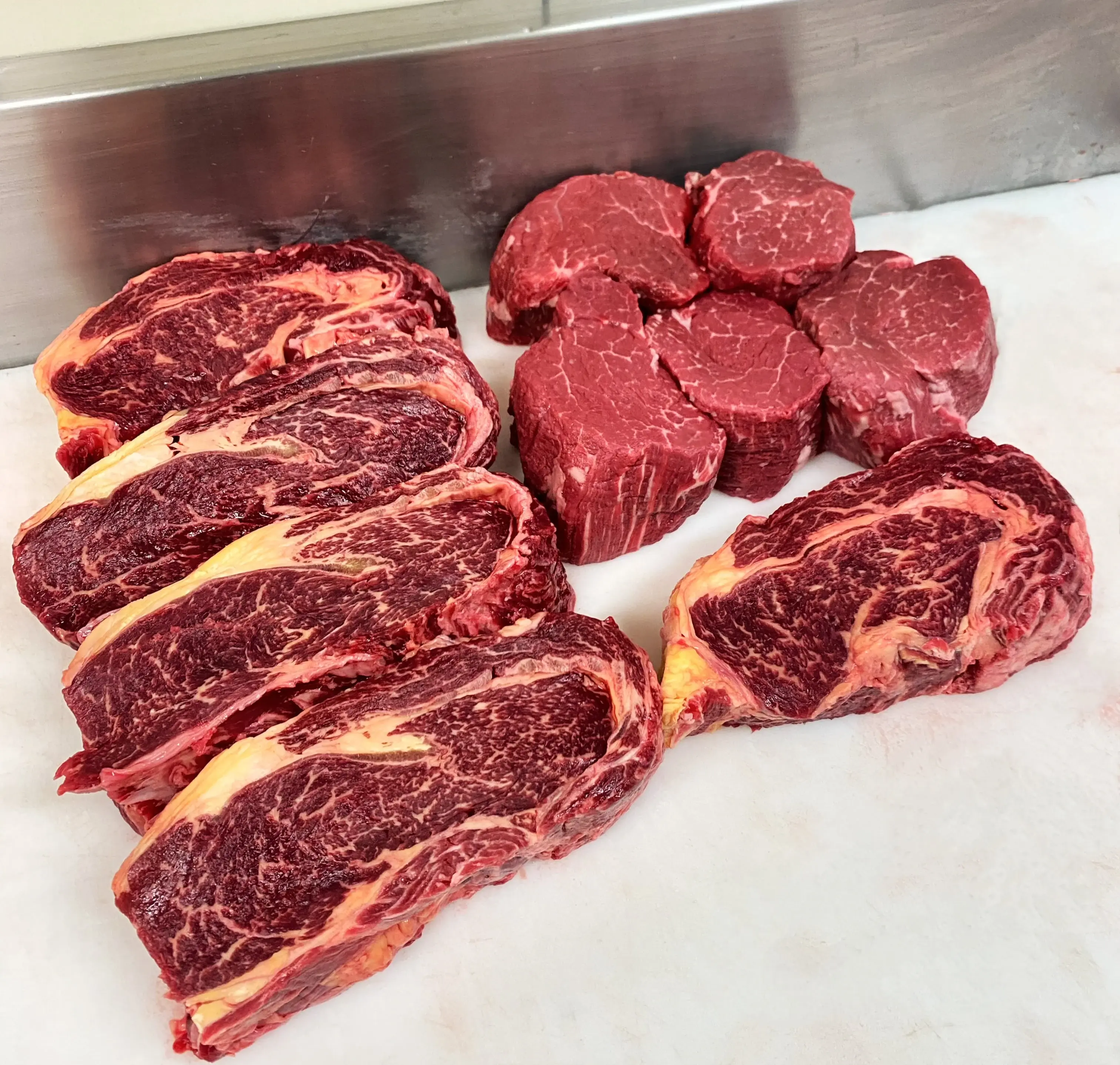 Selection of premium grass-fed steaks showcasing beef quality